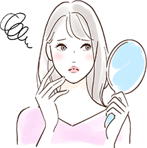 鏡を見て悩む女性